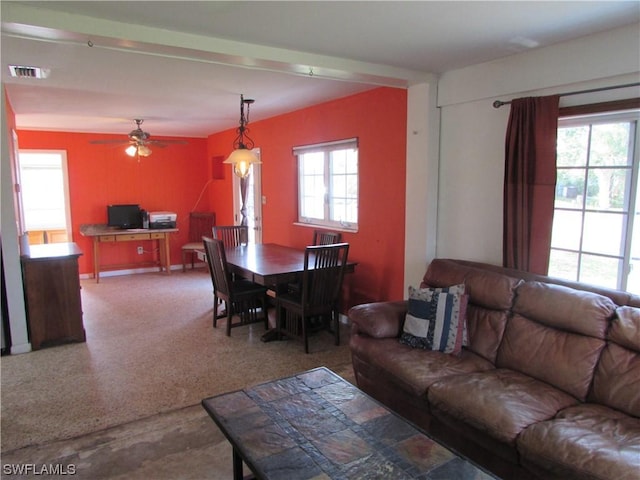 living room featuring ceiling fan