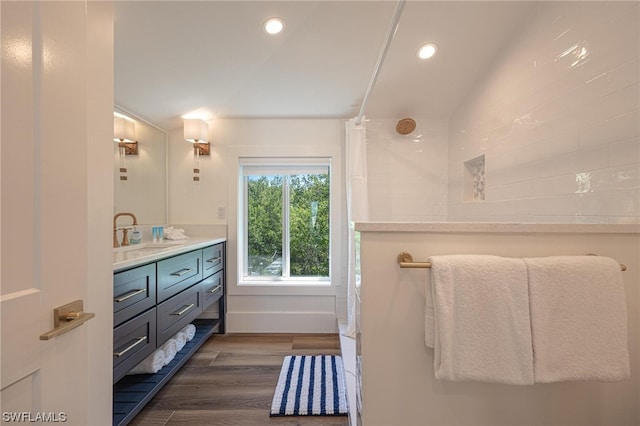 bathroom with vanity and hardwood / wood-style floors