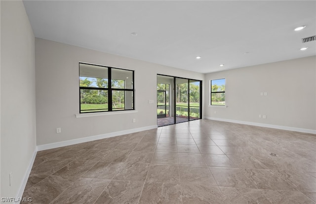 view of tiled empty room