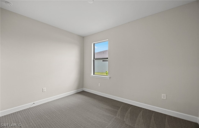 empty room featuring carpet flooring