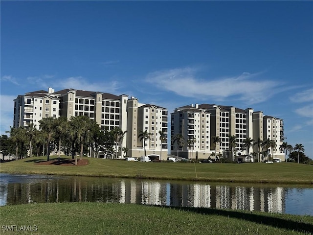 view of building exterior with a water view