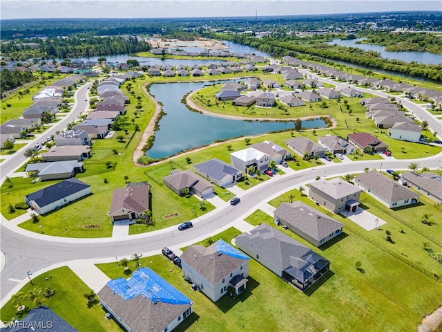 drone / aerial view featuring a water view