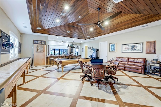 recreation room with ceiling fan, a tray ceiling, billiards, wood ceiling, and light tile patterned floors