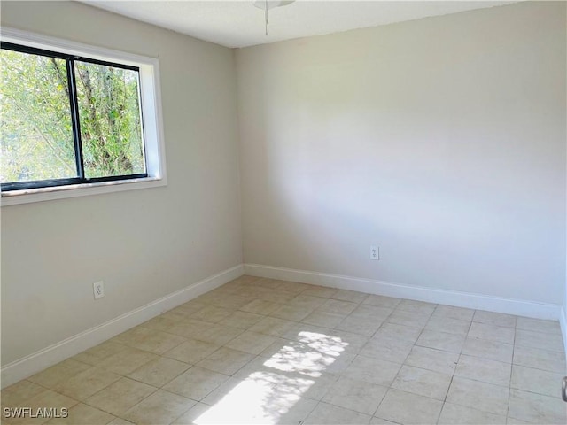 view of tiled spare room