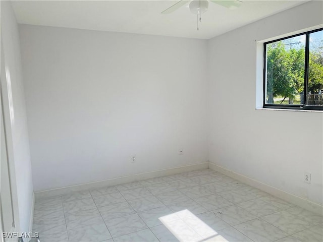 empty room featuring ceiling fan