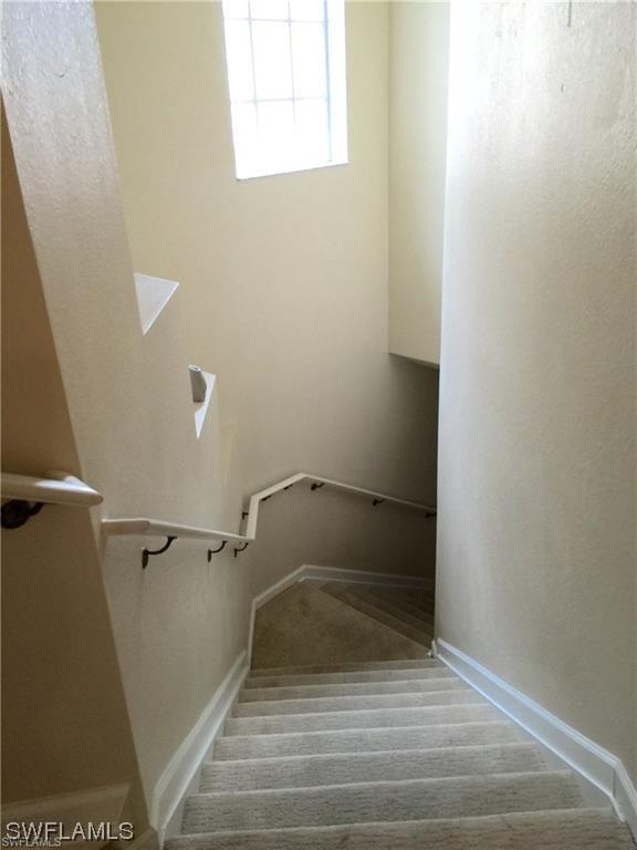 stairway with carpet floors