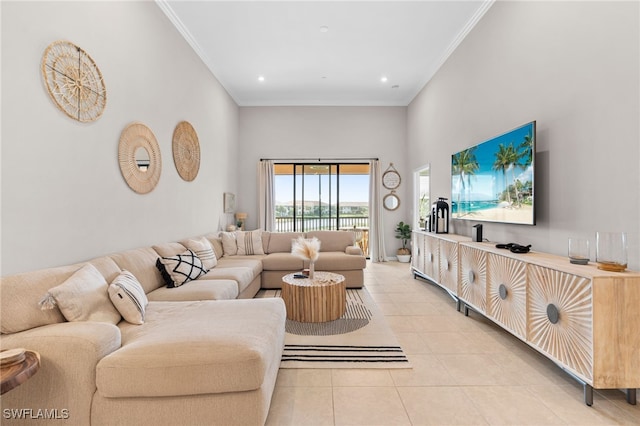 living room featuring ornamental molding and light tile patterned floors