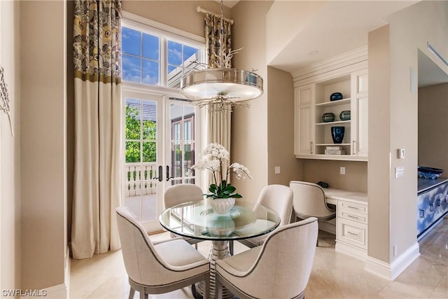 dining room featuring built in desk