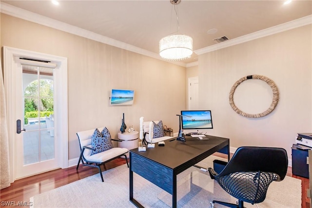 office space featuring crown molding, an inviting chandelier, and wood-type flooring