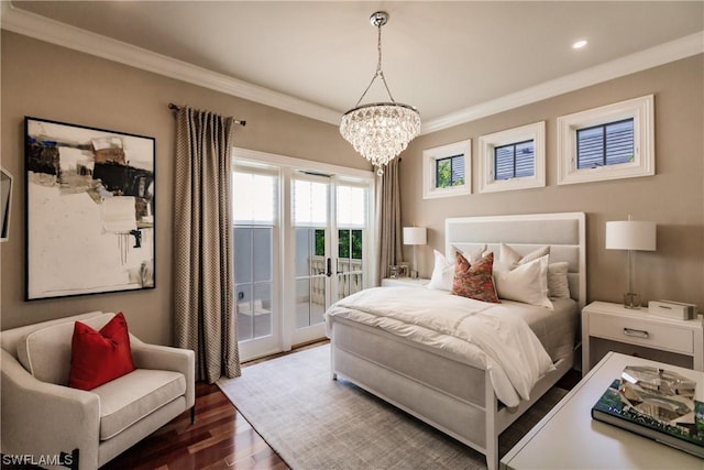 bedroom featuring french doors, crown molding, dark hardwood / wood-style flooring, and access to outside