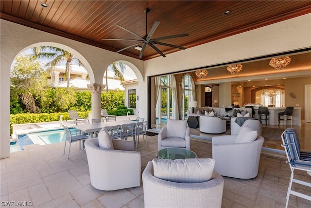 view of patio / terrace featuring an outdoor hangout area and ceiling fan