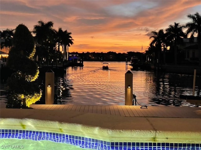 view of water feature with a dock