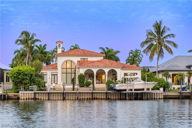 water view featuring a dock