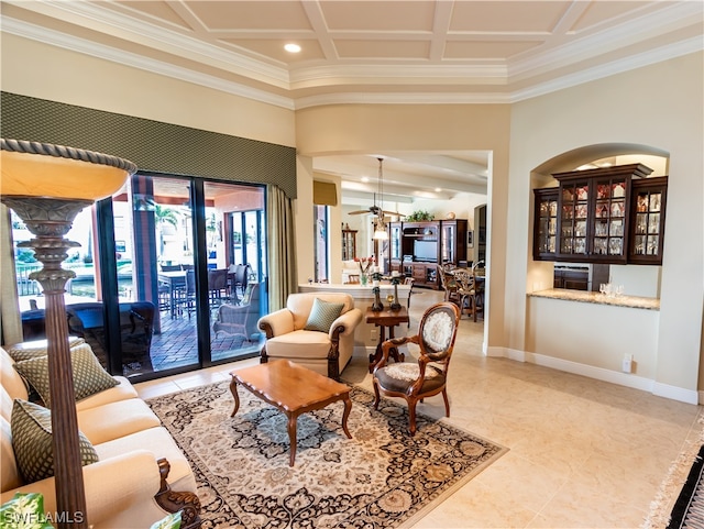 tiled living room featuring crown molding, beamed ceiling, coffered ceiling, and ceiling fan