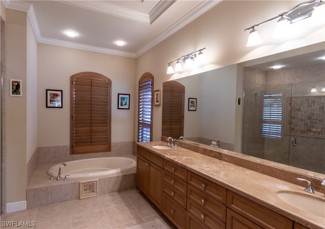 bathroom featuring vanity, crown molding, tile patterned floors, and plus walk in shower