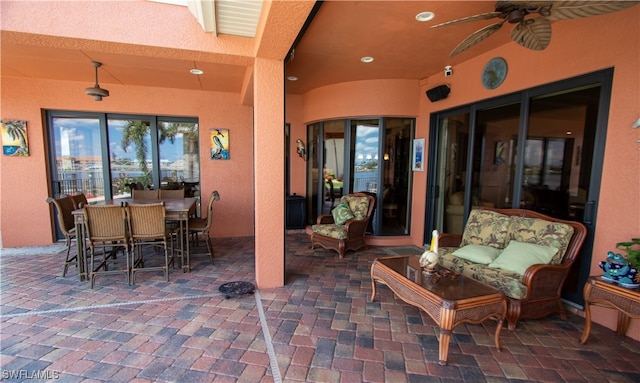 view of patio with ceiling fan