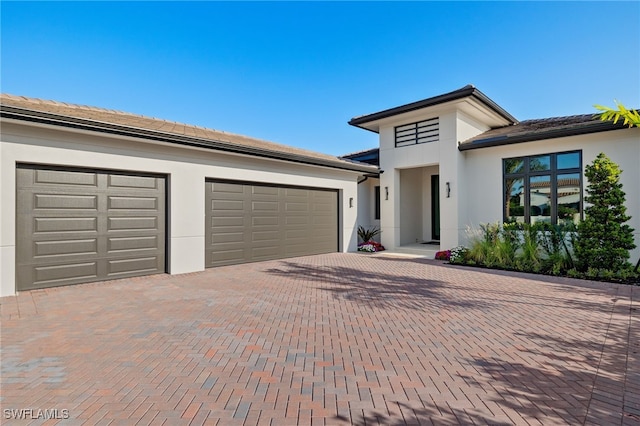 view of front of home with a garage