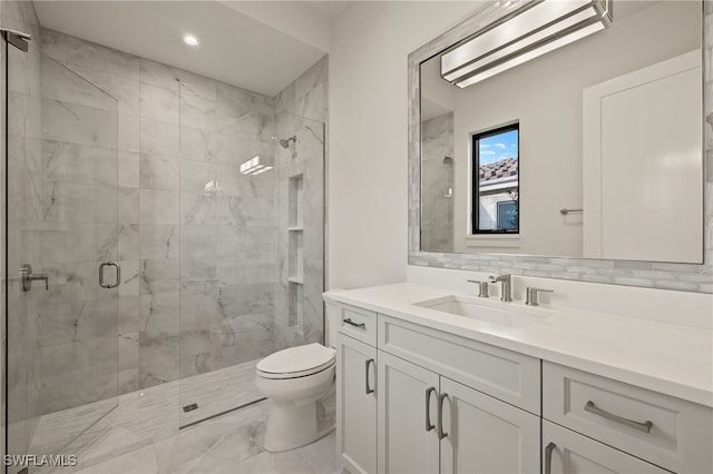 bathroom with vanity, an enclosed shower, backsplash, and toilet