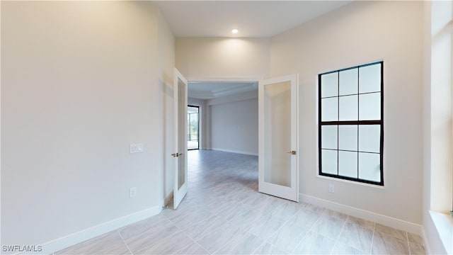 spare room with french doors