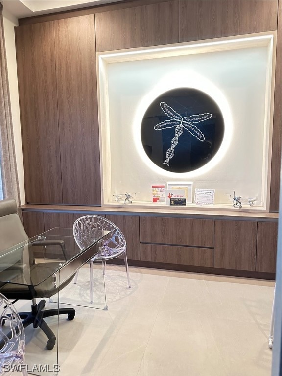 sitting room featuring light tile flooring