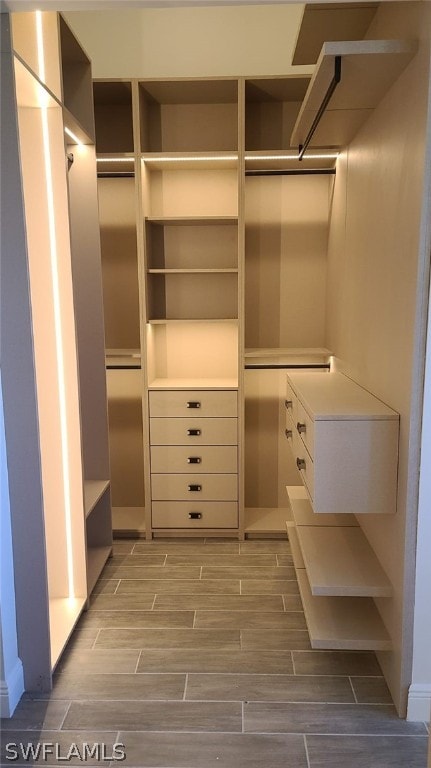 walk in closet featuring light wood-type flooring