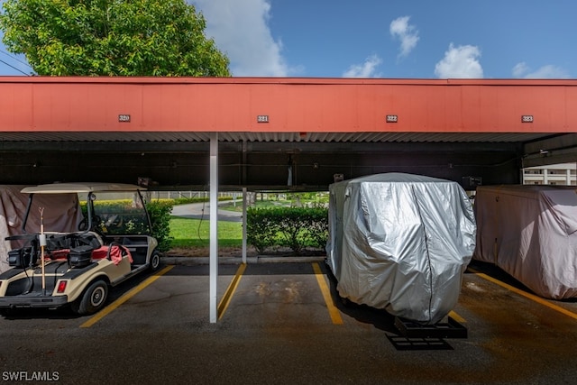 view of parking featuring a carport