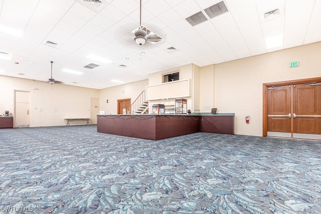 kitchen featuring carpet floors and ceiling fan