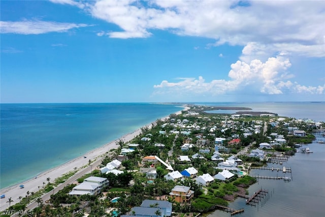 bird's eye view with a view of the beach and a water view