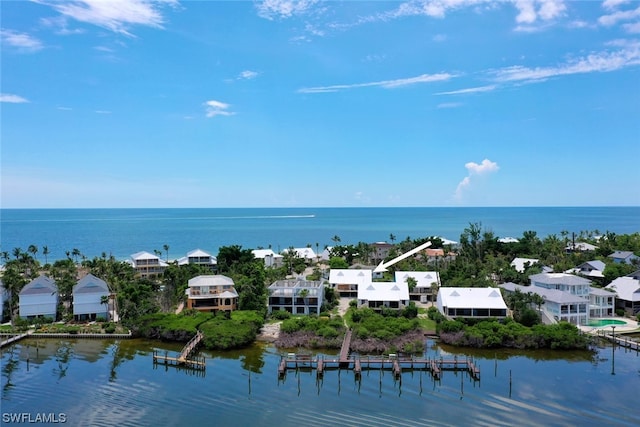 property view of water with a dock