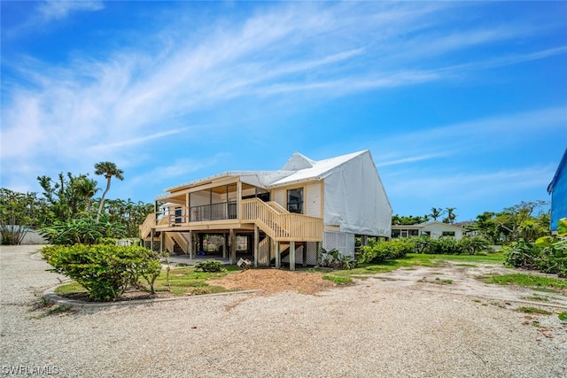 view of front of home with a deck