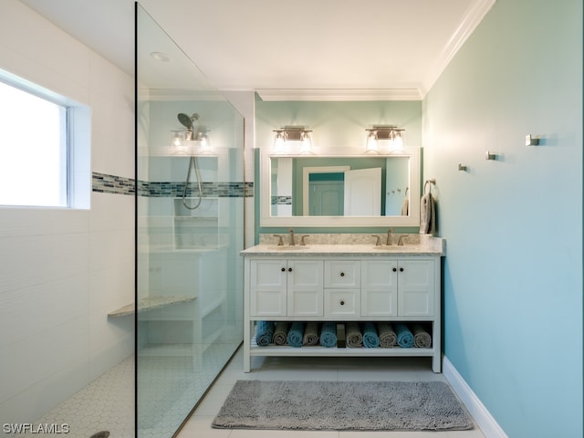 bathroom featuring a shower with door, tile floors, crown molding, and dual bowl vanity