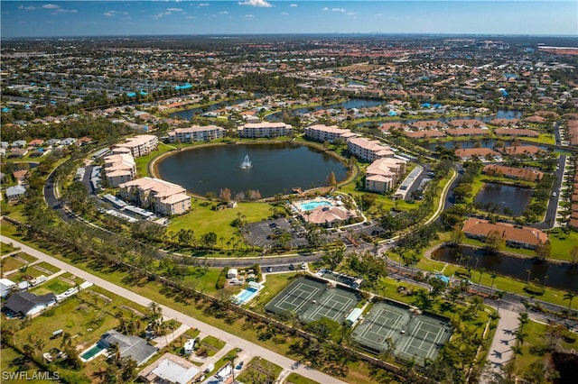 bird's eye view with a water view