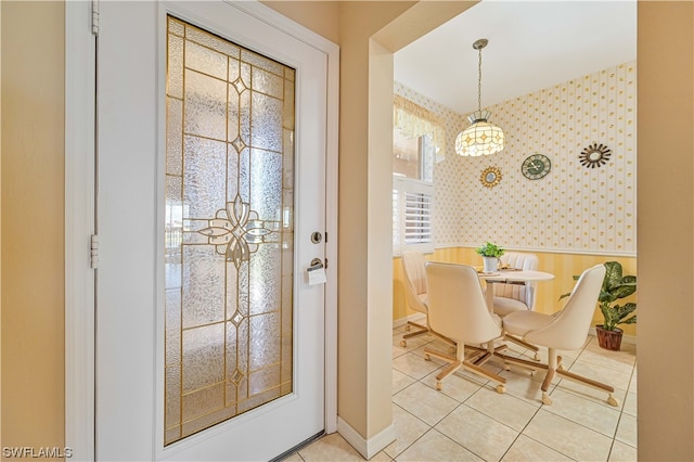 foyer entrance featuring light tile floors