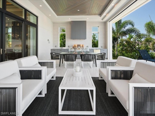 view of patio / terrace with outdoor lounge area and a grill