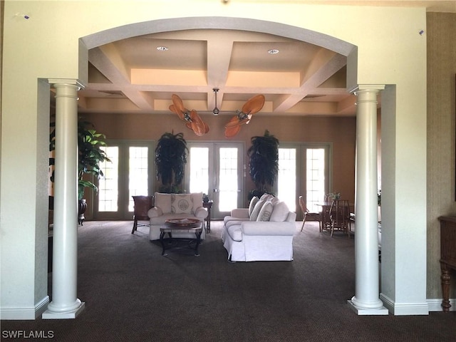 carpeted living room featuring french doors, coffered ceiling, and beam ceiling