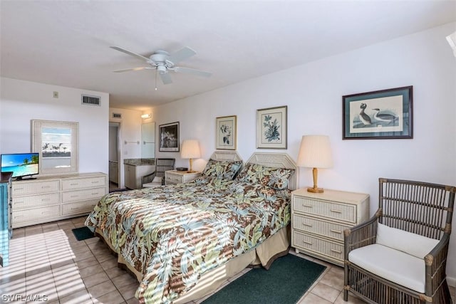 bedroom featuring visible vents, ceiling fan, and tile patterned flooring