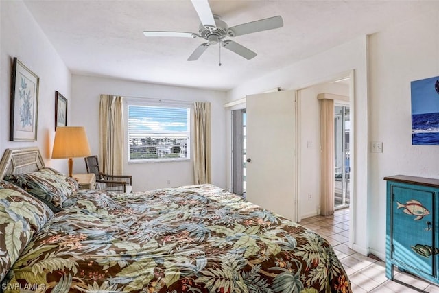 bedroom with light tile patterned floors and ceiling fan