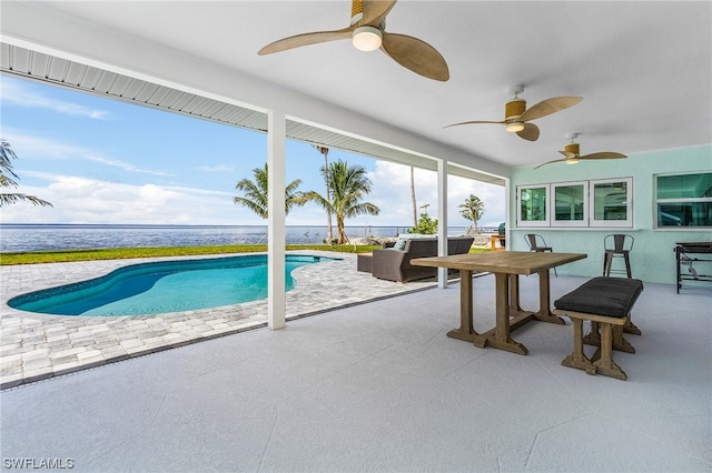 view of pool featuring ceiling fan