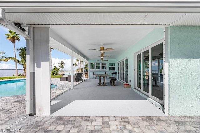 view of patio with ceiling fan