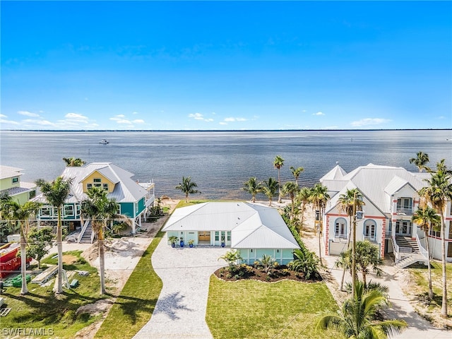 bird's eye view with a water view