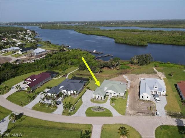 2033 Treasure Ln, Punta Gorda, FL 33982 - aerial view of property and surrounding area featuring a nearby body of water and nearby suburban area
