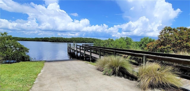 2033 Treasure Ln, Punta Gorda, FL 33982 - dock with a boat ramp and a water view