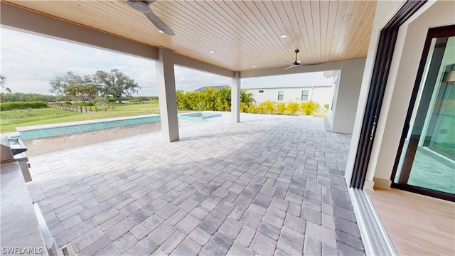 view of terrace featuring ceiling fan