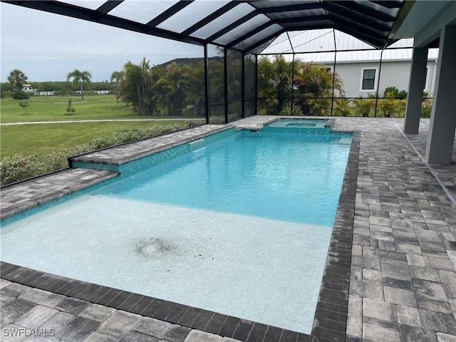 2033 Treasure Ln, Punta Gorda, FL 33982 - view of swimming pool featuring a patio, a lawn, a pool with connected hot tub, and glass enclosure