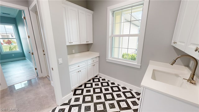 laundry area with sink