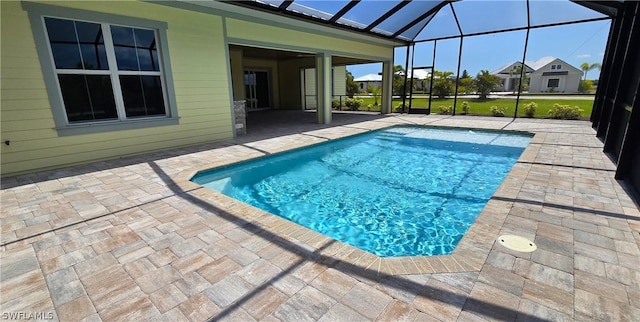 view of pool featuring a lanai and a patio area