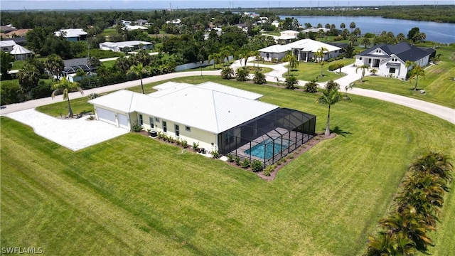 drone / aerial view with a water view