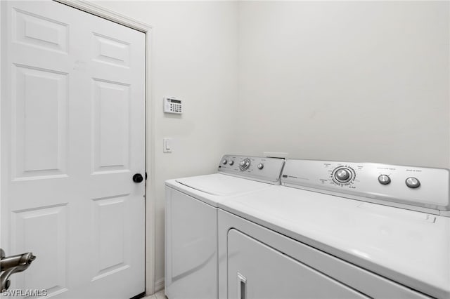 laundry area featuring washing machine and dryer