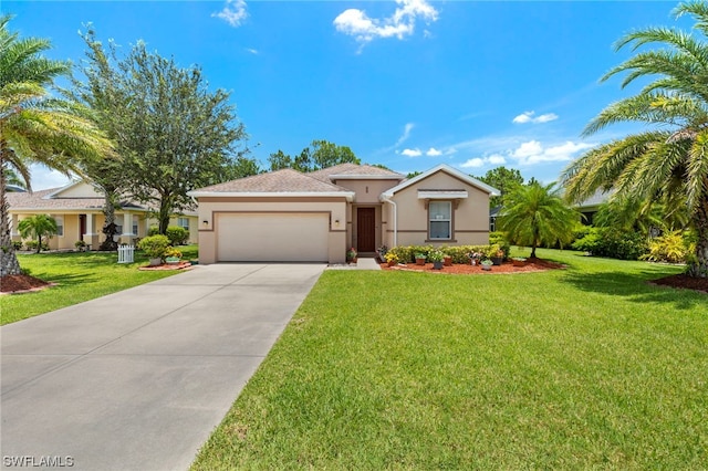 view of front of property with a front lawn and a garage