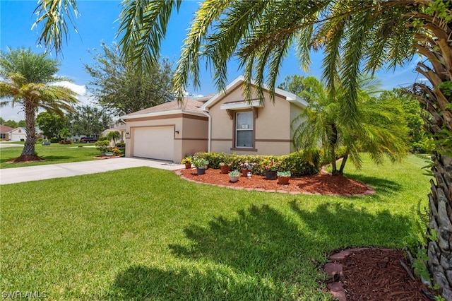 view of front of home featuring a garage and a front yard